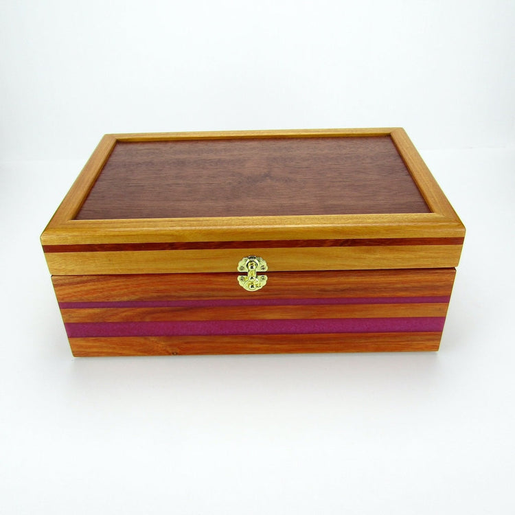 Handmade wooden jewelry boxes from exotic and domestic hardwoods by A Finer Cut Woodworking.