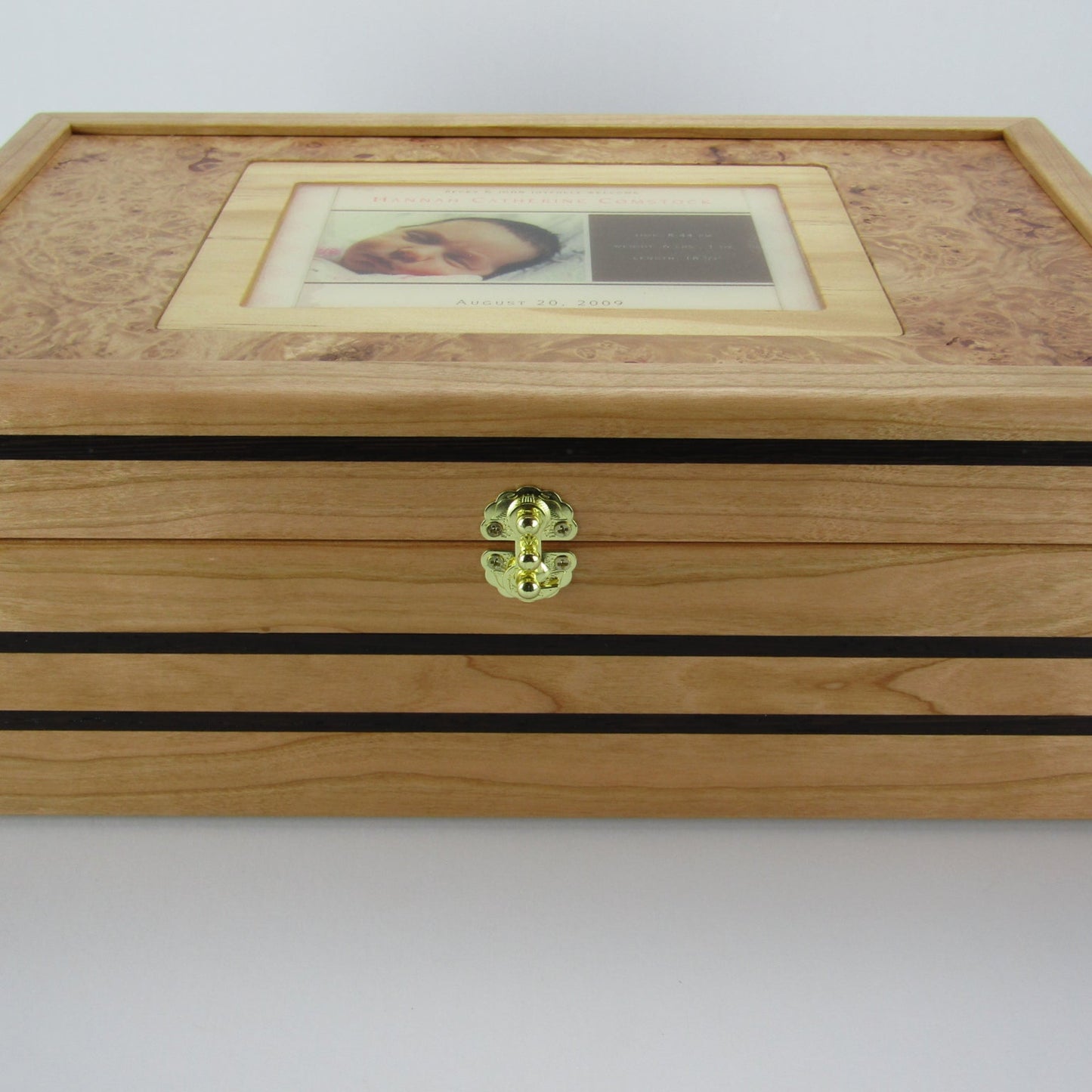 Front view of children's memory box with photo lid handmade from cherry and wenge by A Finer Cut Woodworking.