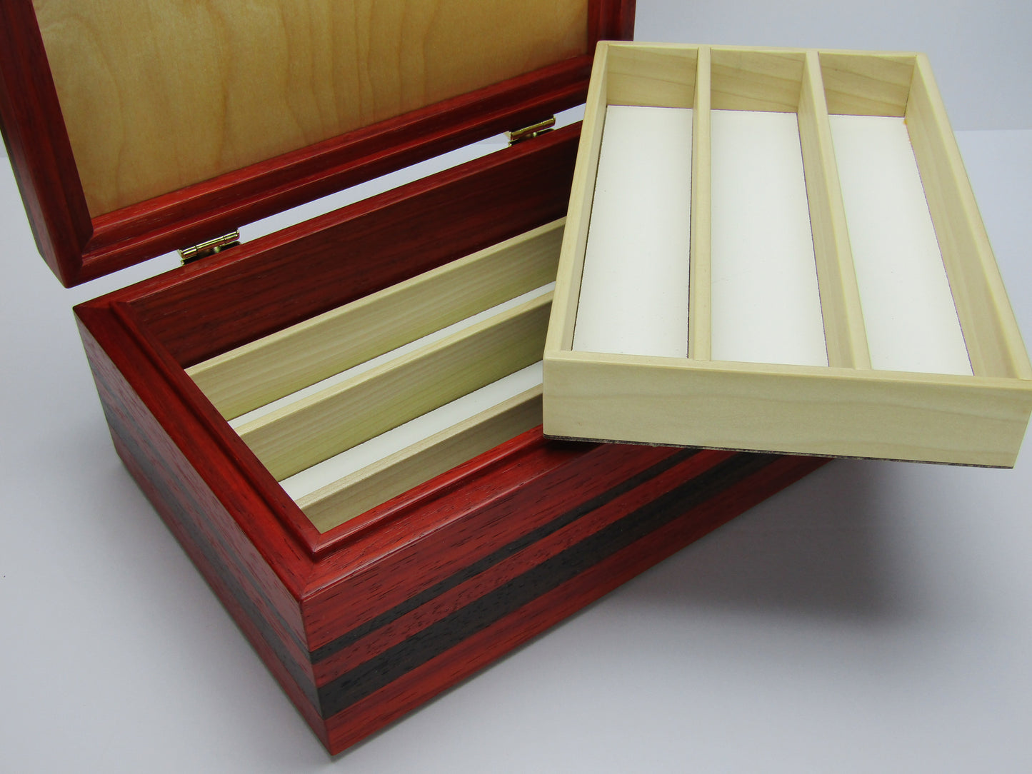 Divided trays for wooden memory box handmade from curly maple and cherry wood by A Finer Cut Woodworking.