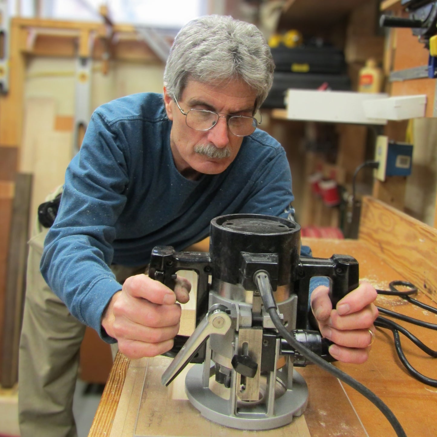 Founder Steve handcrafting wooden boxes for keepsakes from exotic and domestic hardwoods at A Finer Cut Woodworking.