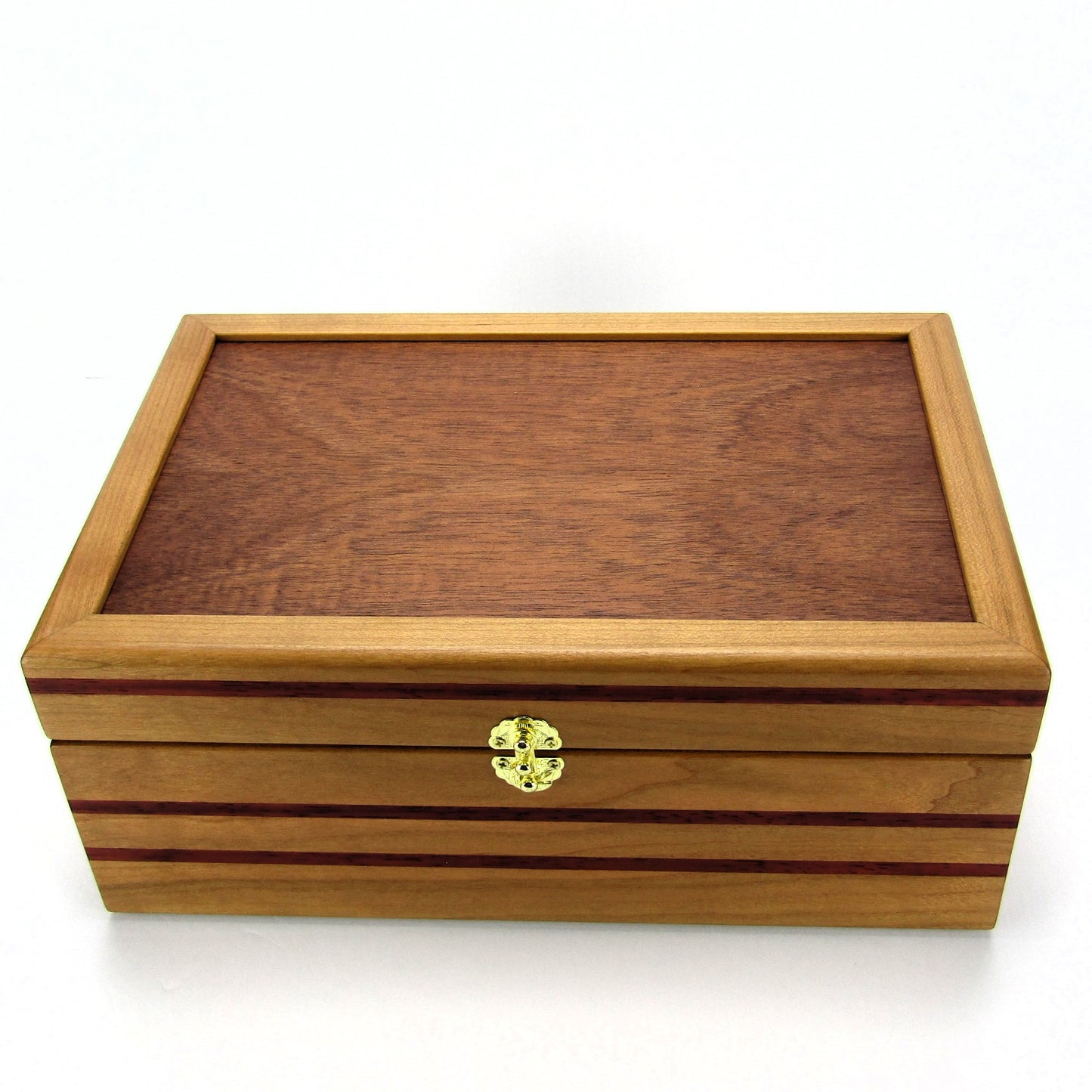 Top view of handmade memory box crafted from cherry and mahogany wood with padauk inlays by A Finer Cut Wood.