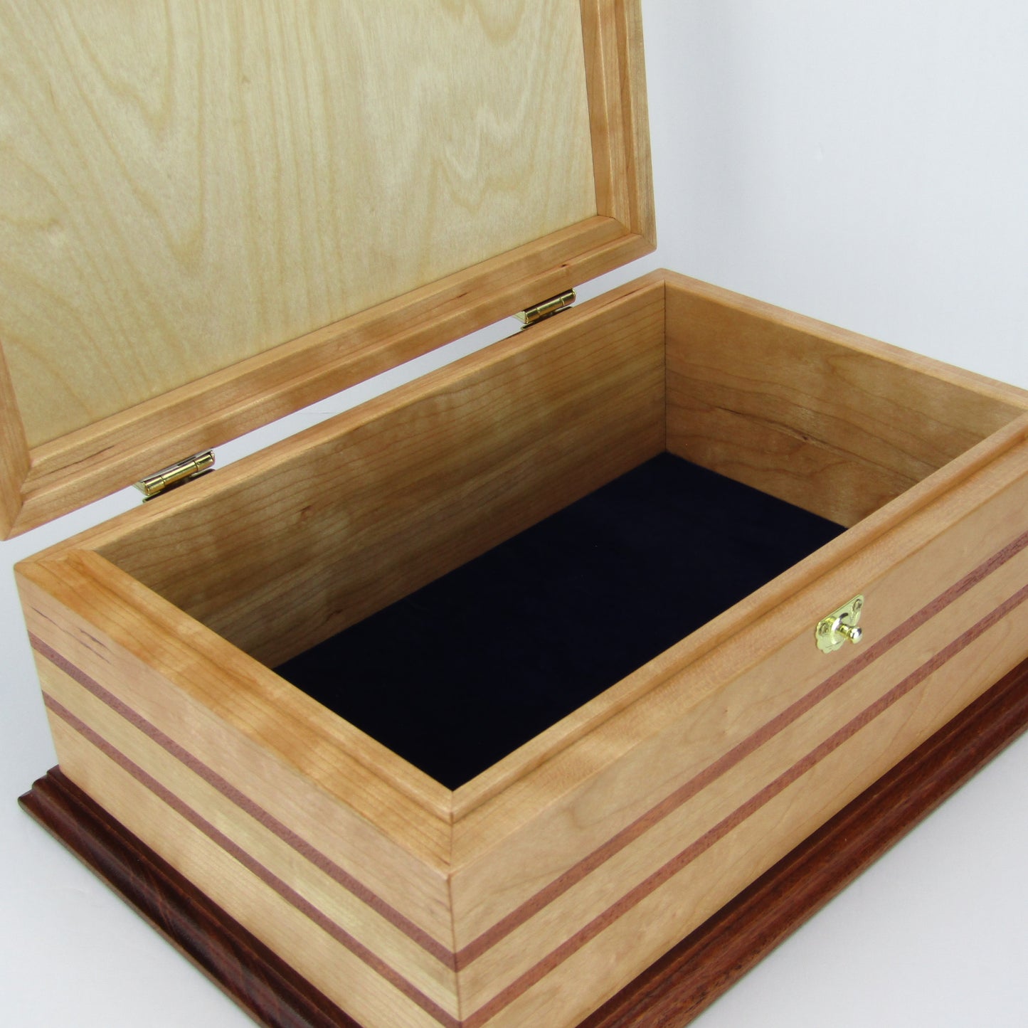 Interior view of handmade wood jewelry box crafted from cherry with Brazilian cherry inlays by A Finer Cut Woodwork.