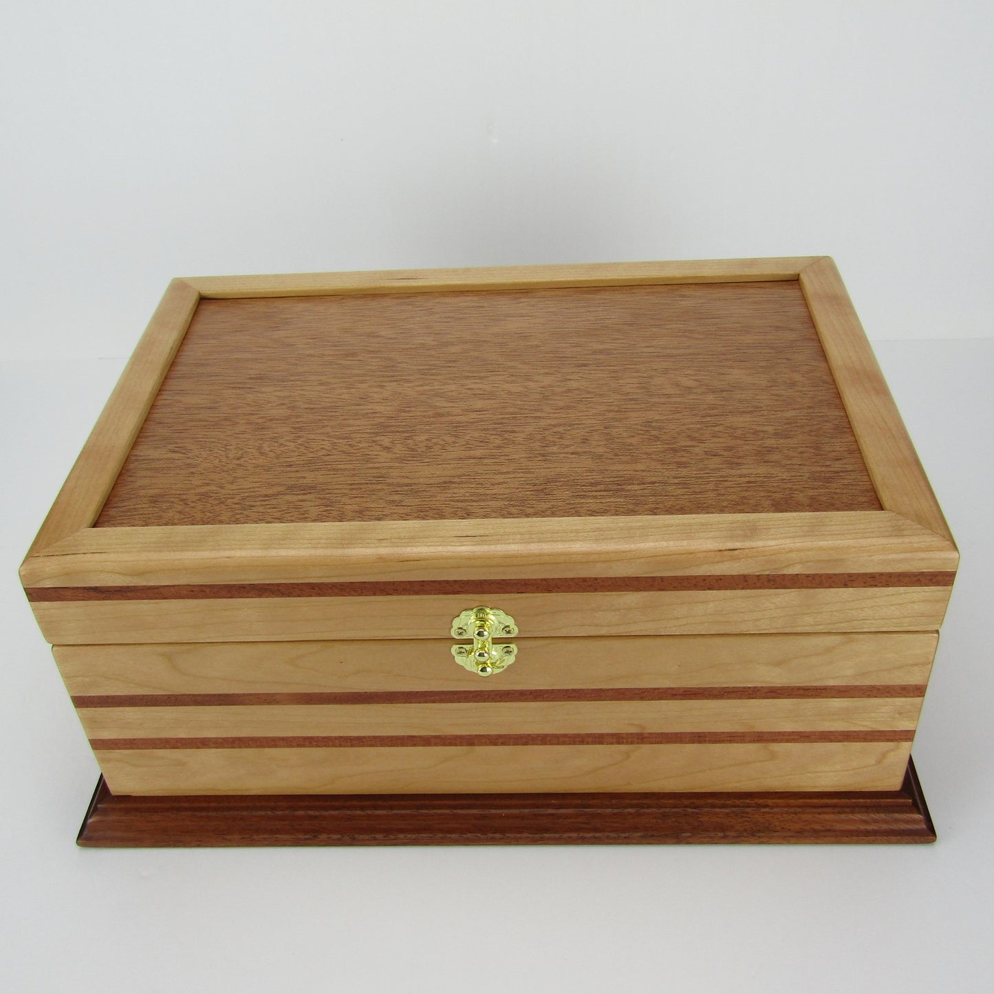 Top view of handmade wood jewelry box crafted from cherry with Brazilian cherry inlays by A Finer Cut Woodwork.