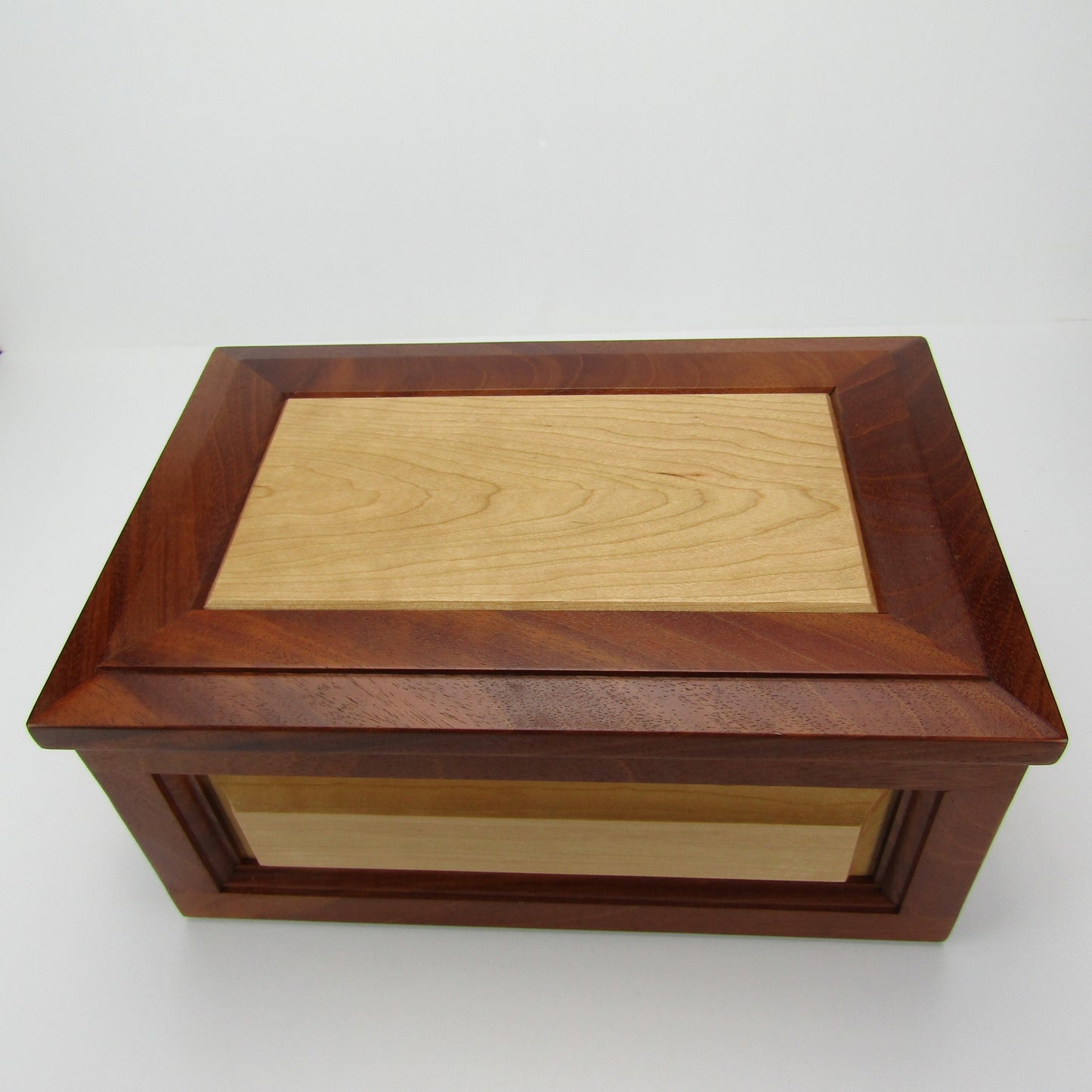 Top view of large keepsake box handmade from Honduran mahogany and cherry by A Finer Cut Woodworking.
