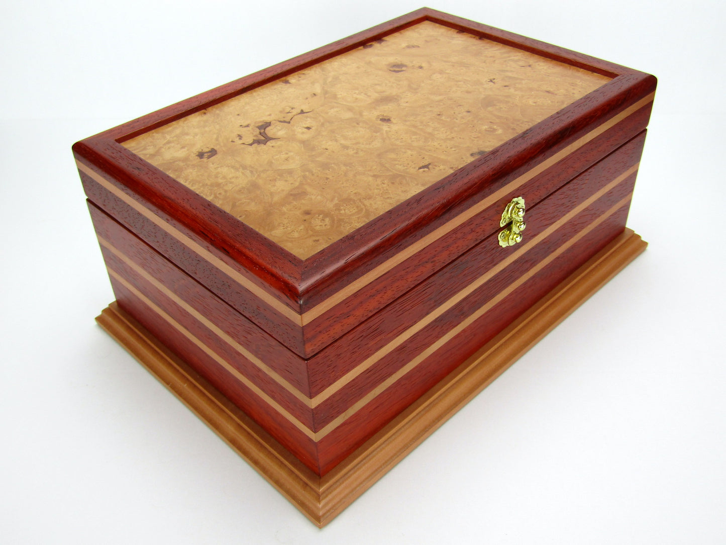 Front view of unique memorial keepsake box handmade from red padauk and pear wood by A Finer Cut Woodworking.