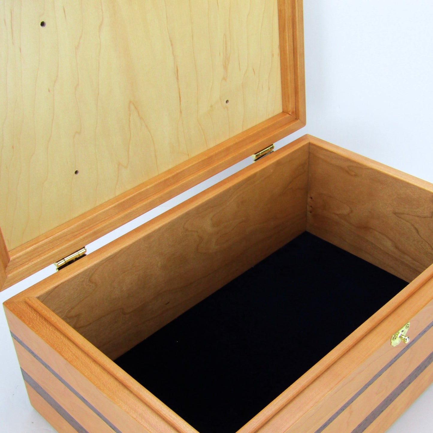 Interior view of memory box handcrafted from cherry, wenge, and mahogany burl veneer by A Finer Cut Woodworking.
