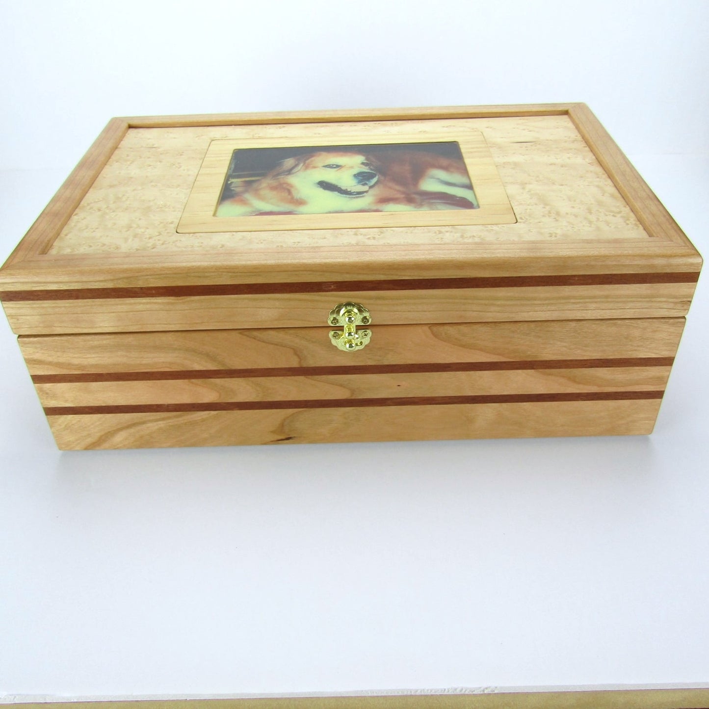Front view of pet memorial box with photo lid handmade from cherry, mahogany, and birds eye maple veneer by A Finer Cut Woodwork.