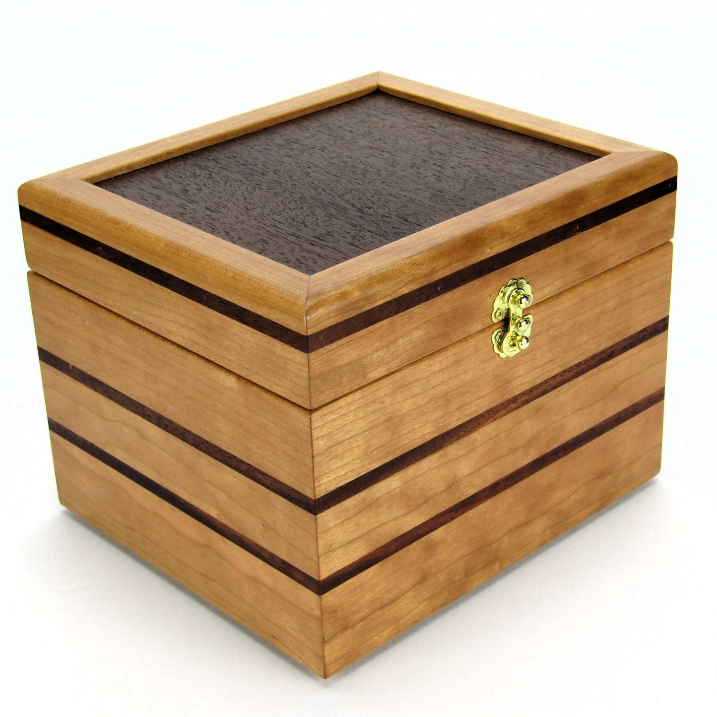 Full view corner of unique small keepsake box handmade from cherry, mahogany and Peruvian walnut wood by A Finer Cut.