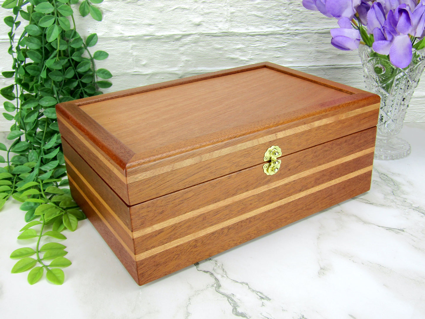 Thumbnail of valet box for men handcrafted from mahogany with cherry wood inlays by A Finer Cut Woodworking.
