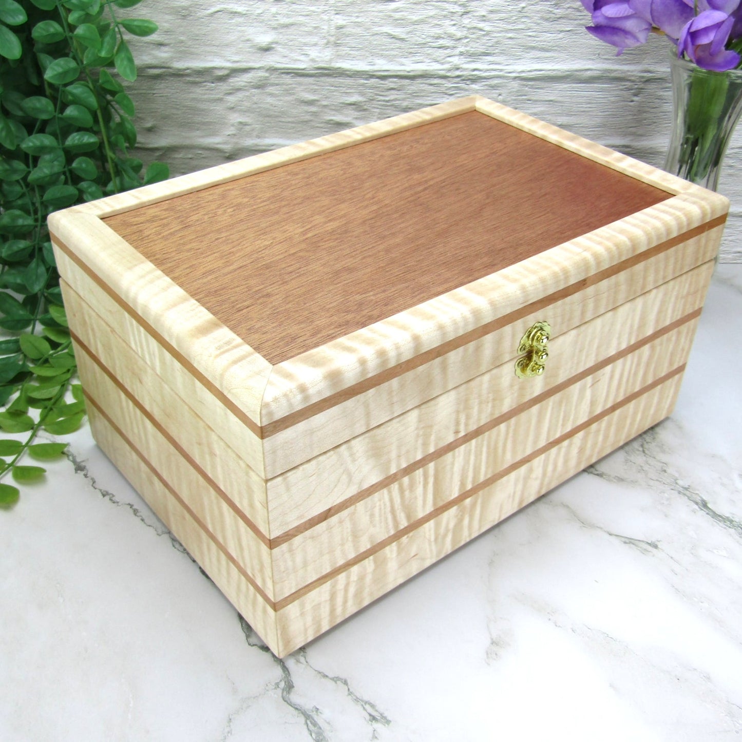 Thumbnail of wooden memory box handmade from curly maple and cherry wood by A Finer Cut Woodworking.