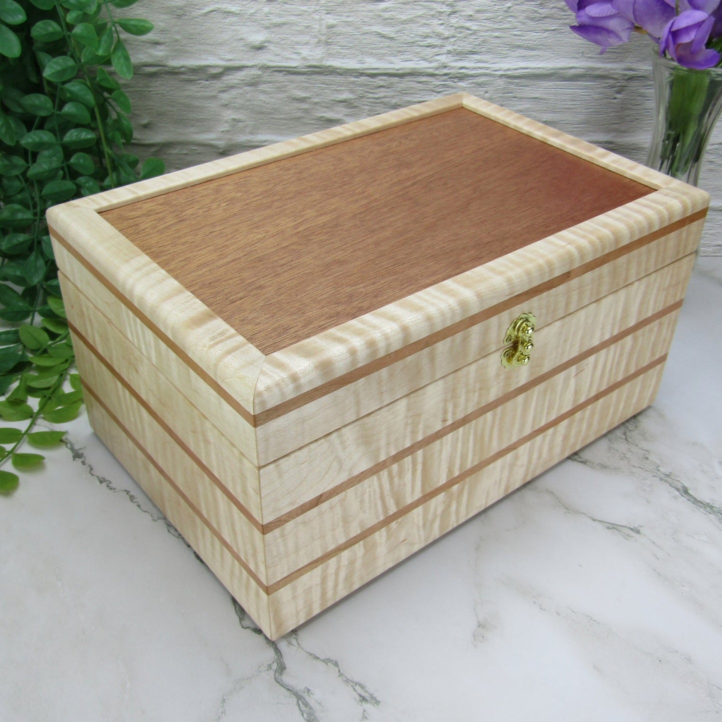 Thumbnail of wooden memory box handmade from curly maple and cherry wood by A Finer Cut Woodworking.