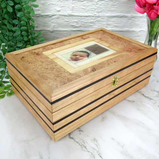 Thumbnail of children's memory box with photo lid handmade from cherry and wenge by A Finer Cut Woodworking. 