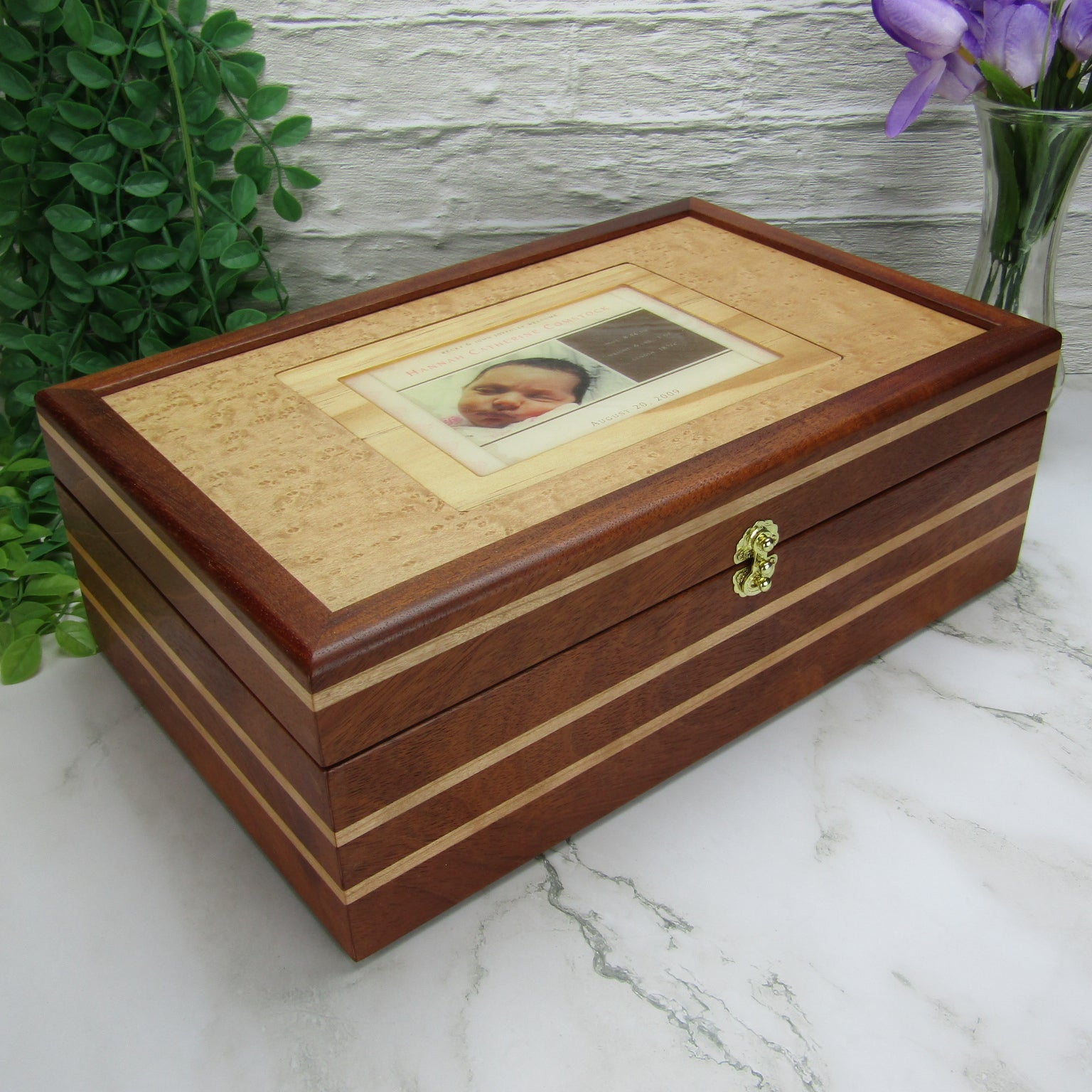 Thumbnail of children's memory box with photo lid handmade from mahogany, cherry, and maple burl veneer by A Finer Cut Woodworking. 