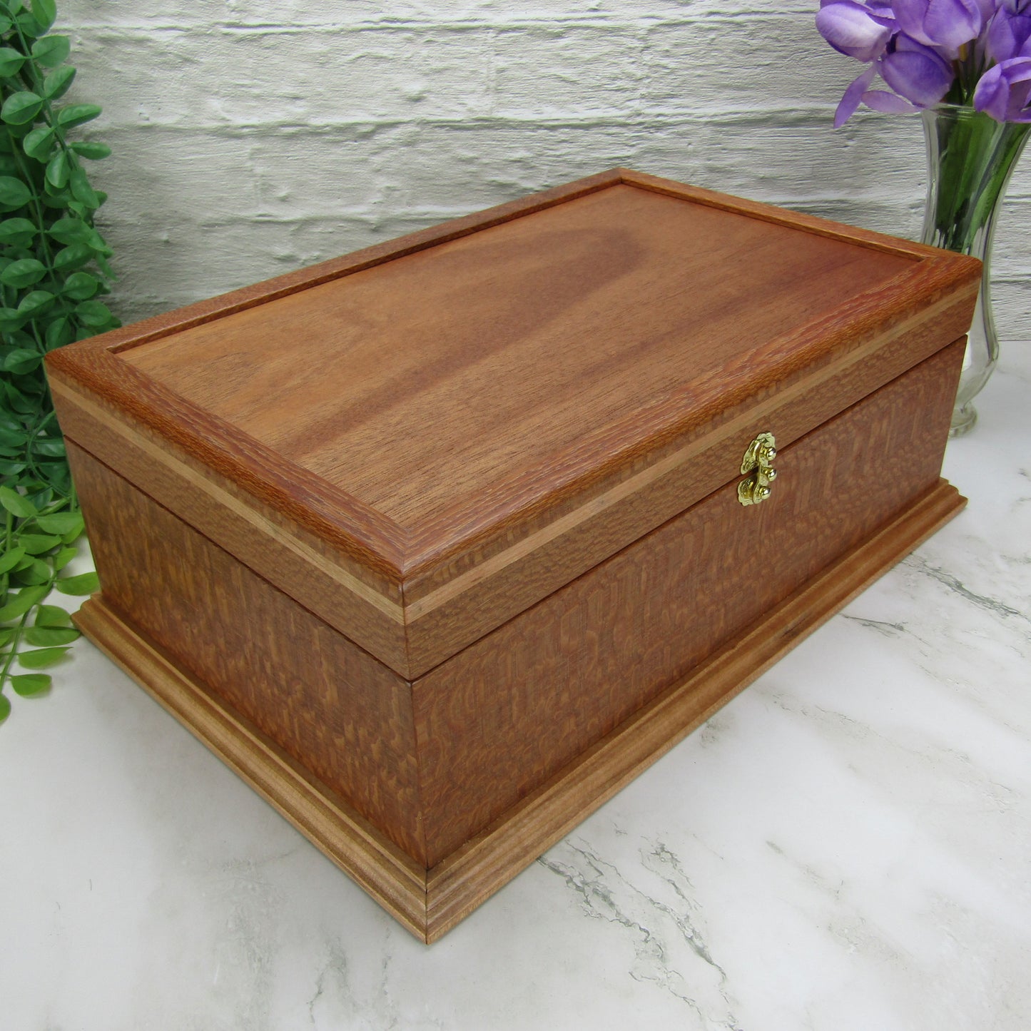Thumbnail of handmade keepsake box crafted from leopardwood, cherry, and mahogany veneer by A Finer Cut Woodworking.