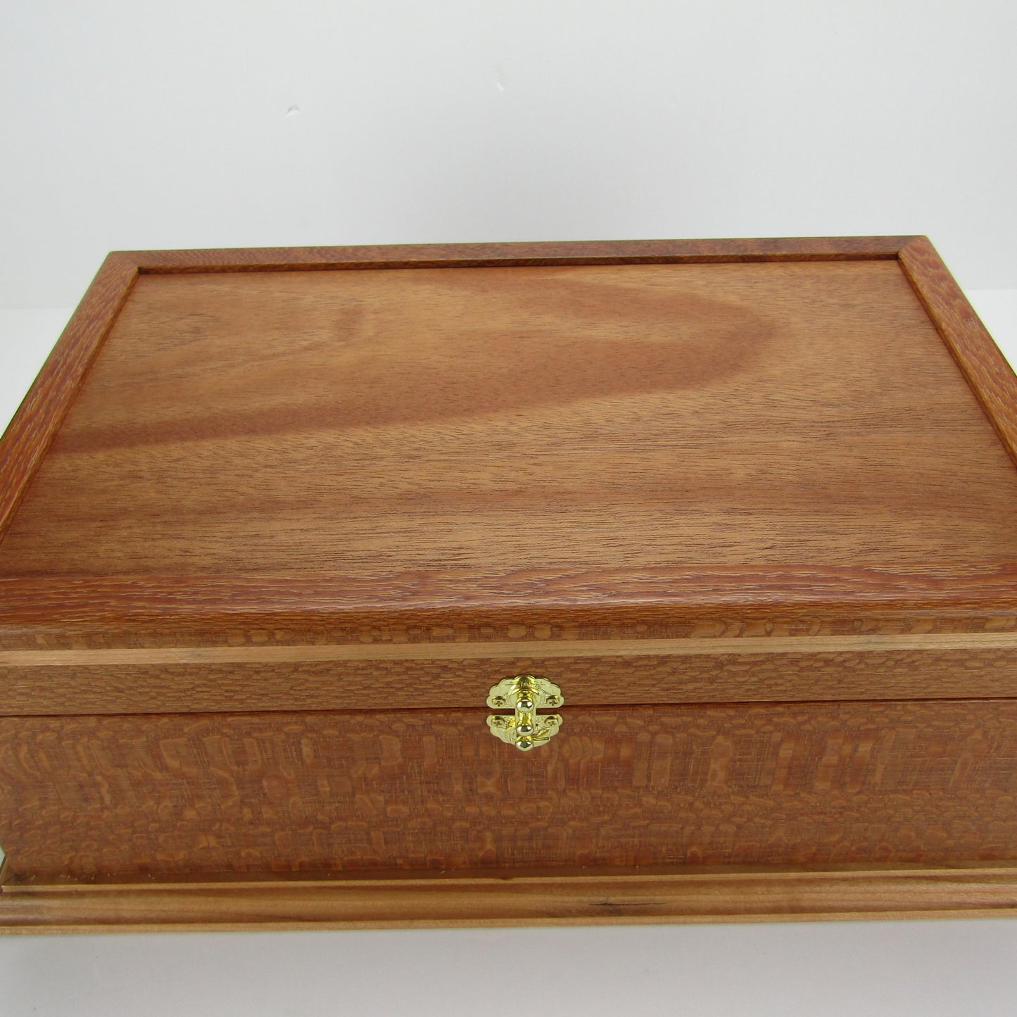Top view of handmade keepsake box crafted from leopardwood, cherry, and mahogany veneer by A Finer Cut Woodworking.