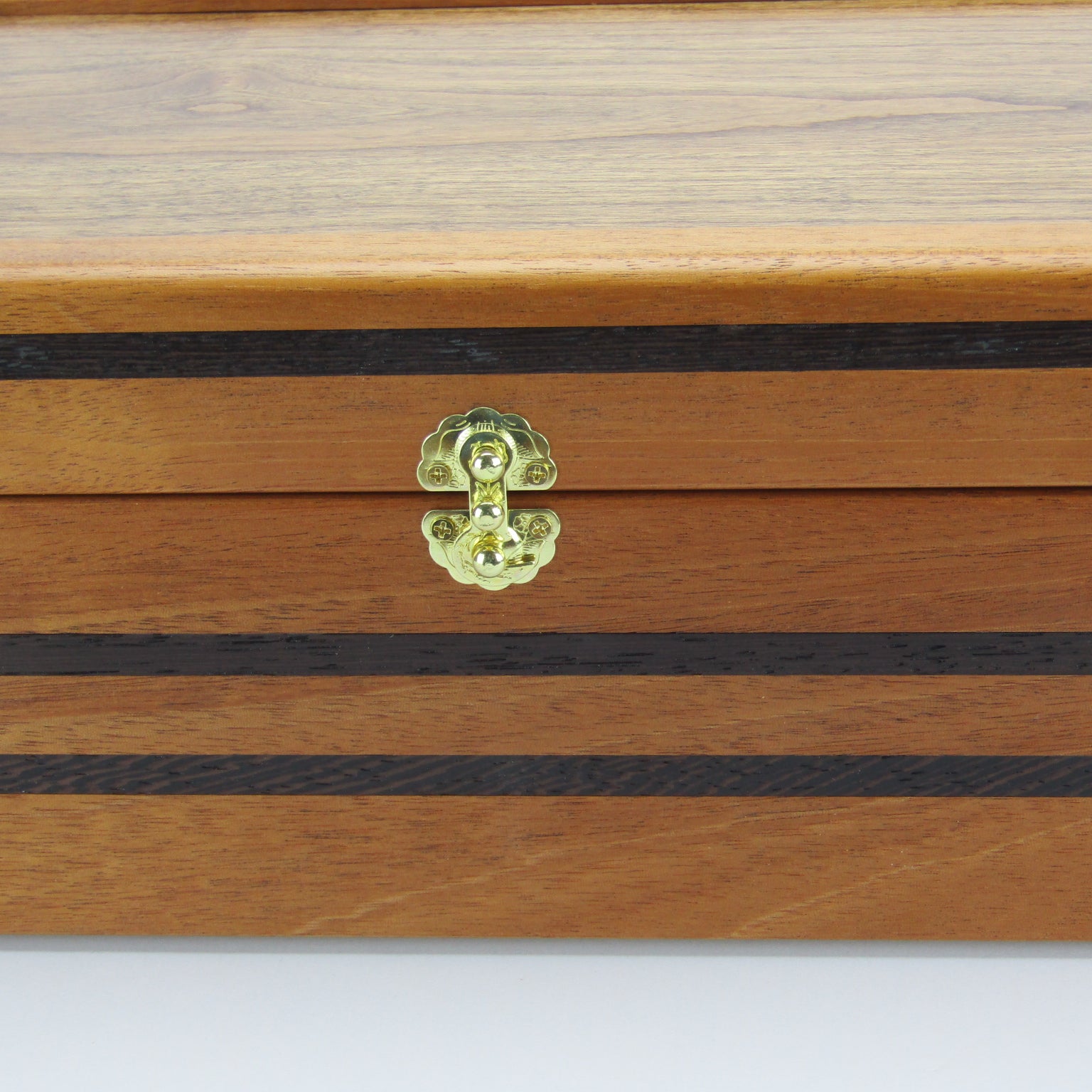 Front view of handmade memory box crafted from mahogany, wenge, and dark finished cherry veneer by A Finer Cut Woodworking.