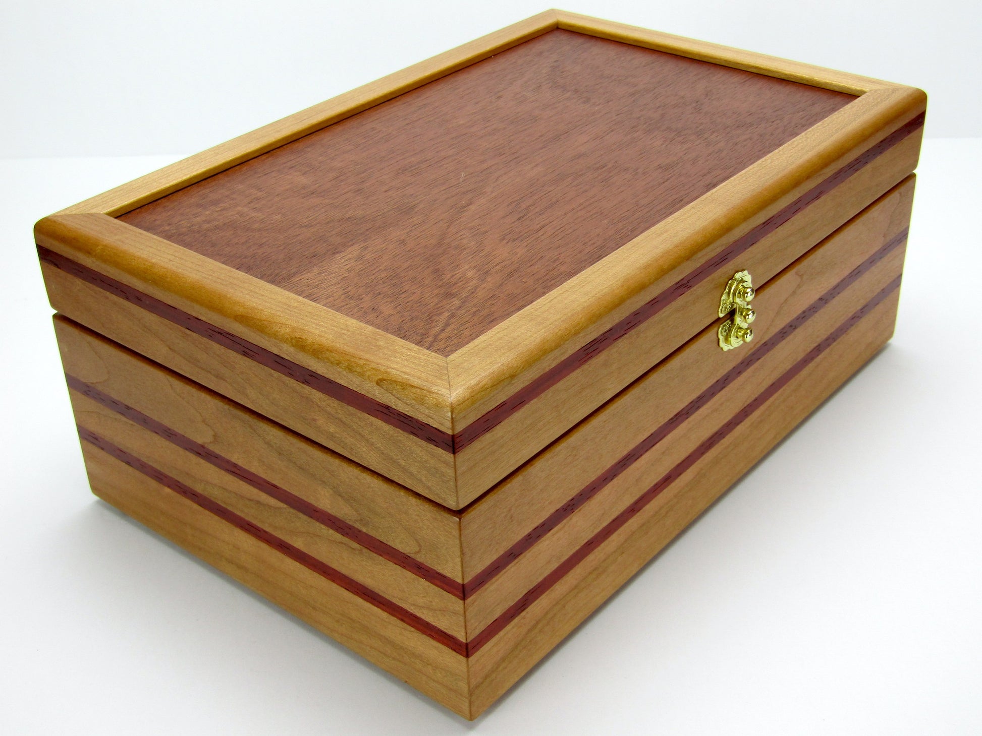 Front view of handmade memory box crafted from cherry and mahogany wood with padauk inlays by A Finer Cut Wood.