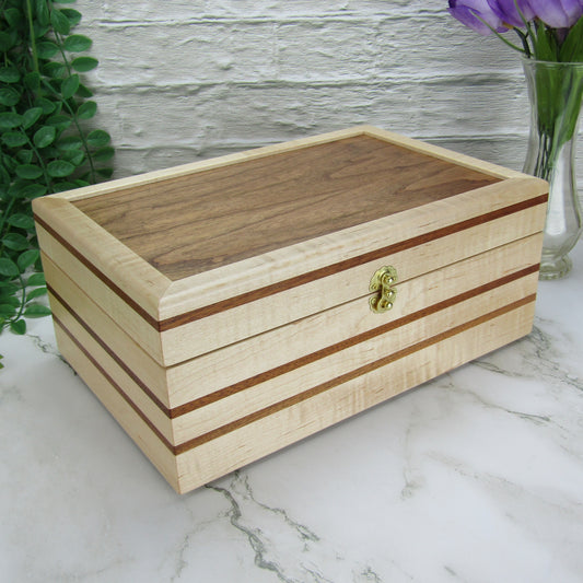 >Thumbnail of handmade memory box crafted from maple, mahogany, and dark finished cherry veneer by A Finer Cut Woodworking.