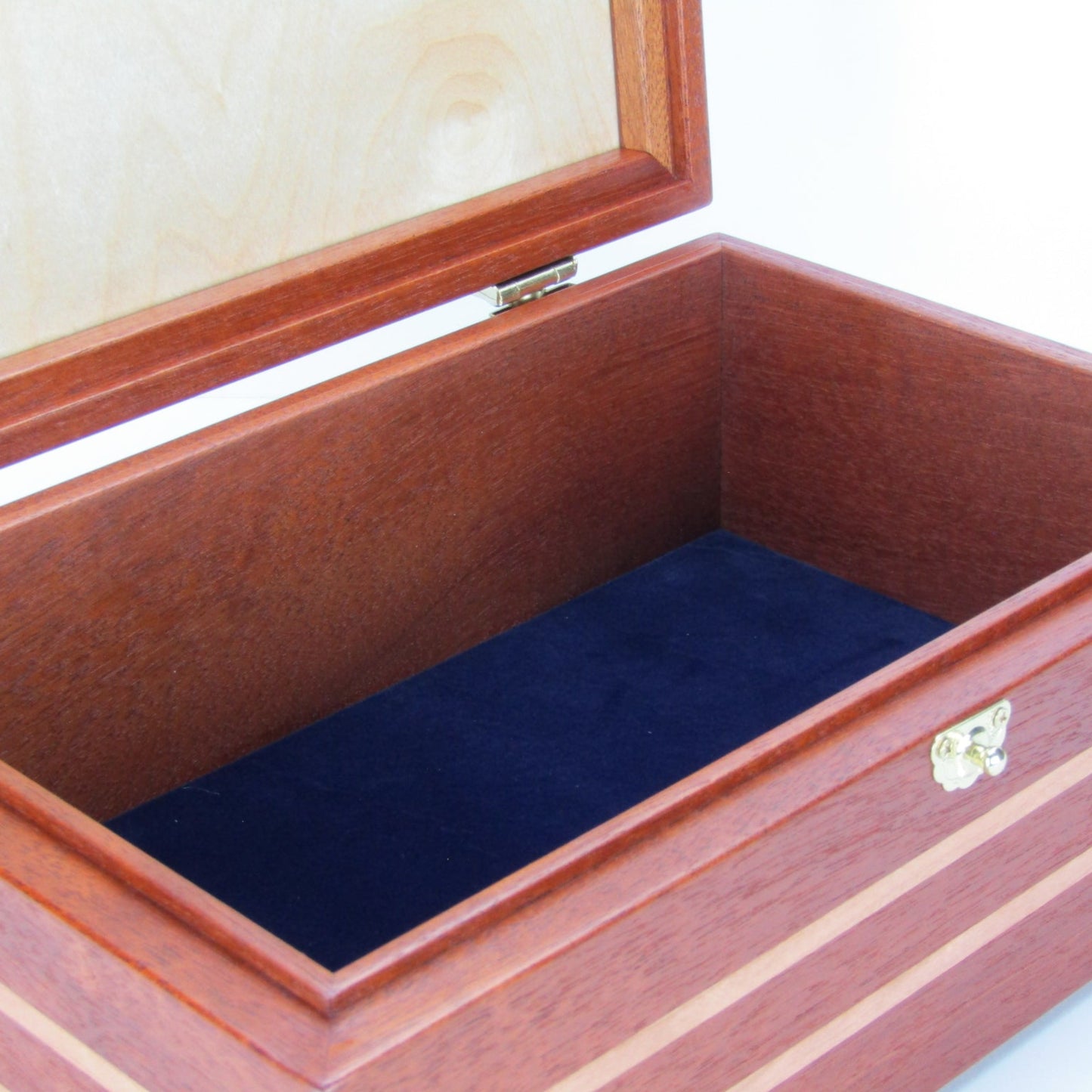 Interior view of handmade wood jewelry box crafted from mahogany, cherry, and mahogany veneer by A Finer Cut Woodwork.