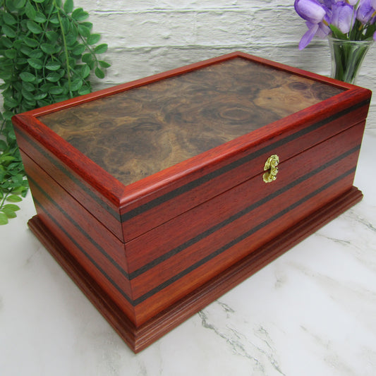 Thumbnail of handmade wooden box crafted from padauk, wenge, Brazilian cherry, and walnut burl veneer by A Finer Cut Woodworking.