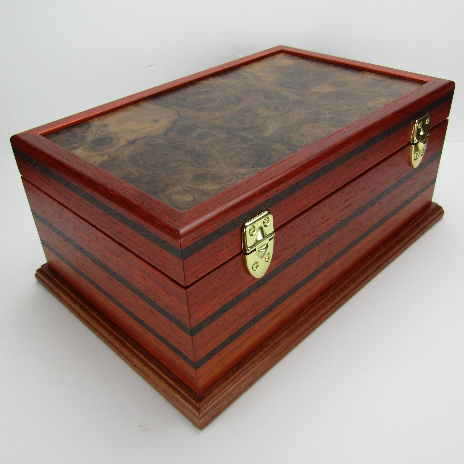 Back view of  handmade wooden box crafted from padauk, wenge, Brazilian cherry, and walnut burl veneer by A Finer Cut Woodworking.
