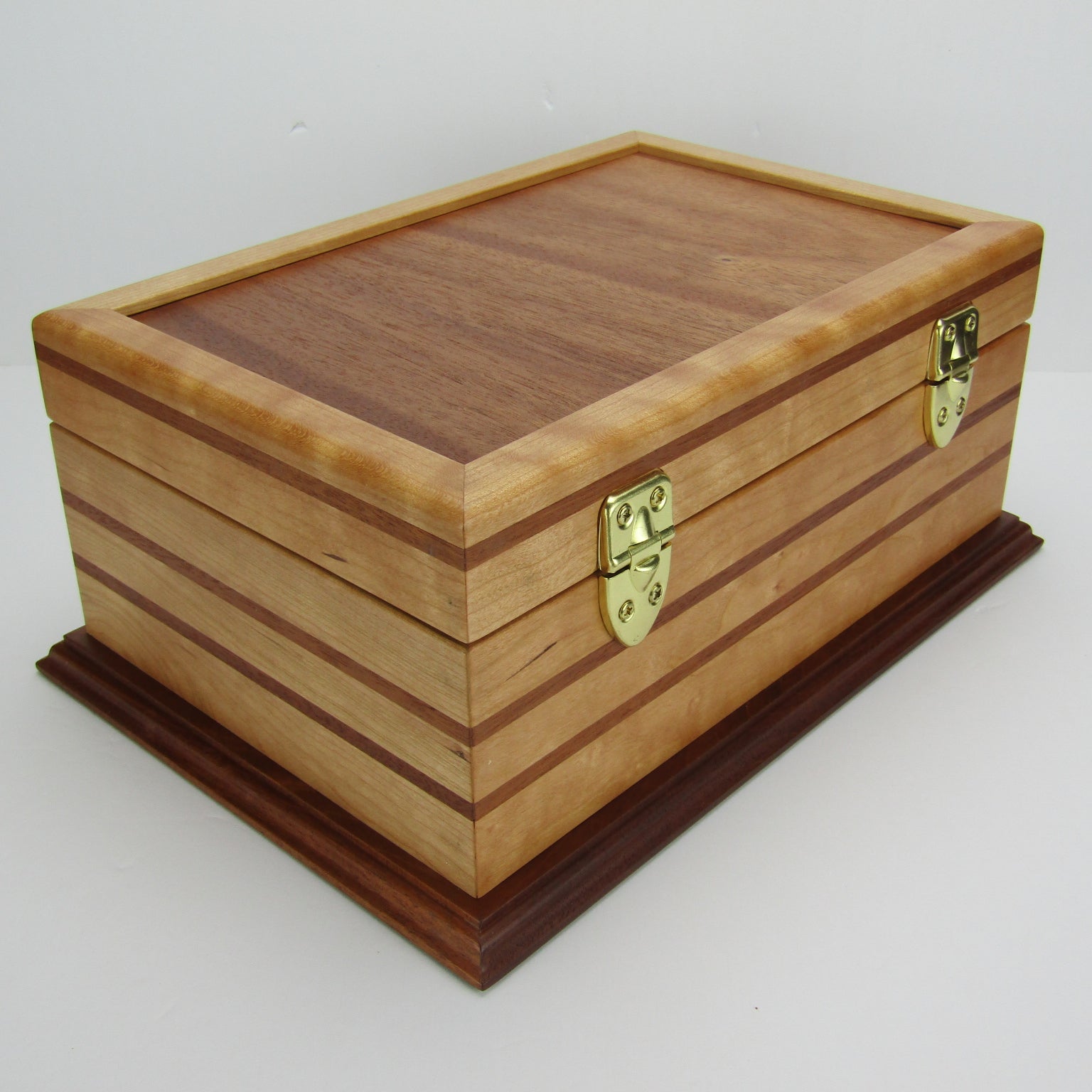 Back view of handmade wood jewelry box crafted from cherry, mahogany, and mahogany veneer by A Finer Cut Woodworking.