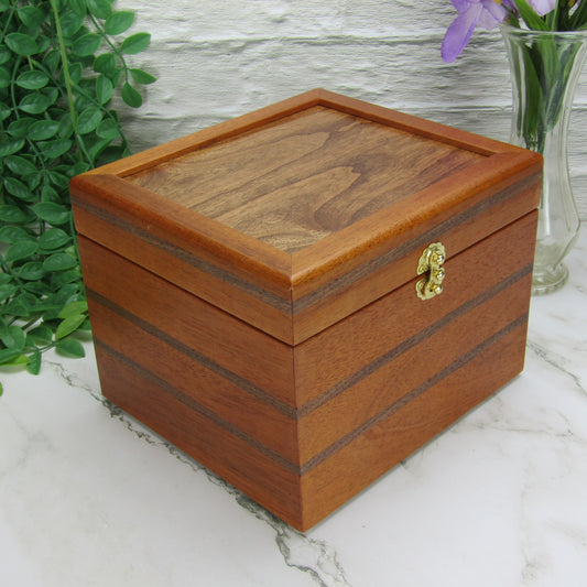Thumbnail of keepsake memory box handmade from mahogany, walnut, and dark finished cherry veneer by A Finer Cut Woodworking.