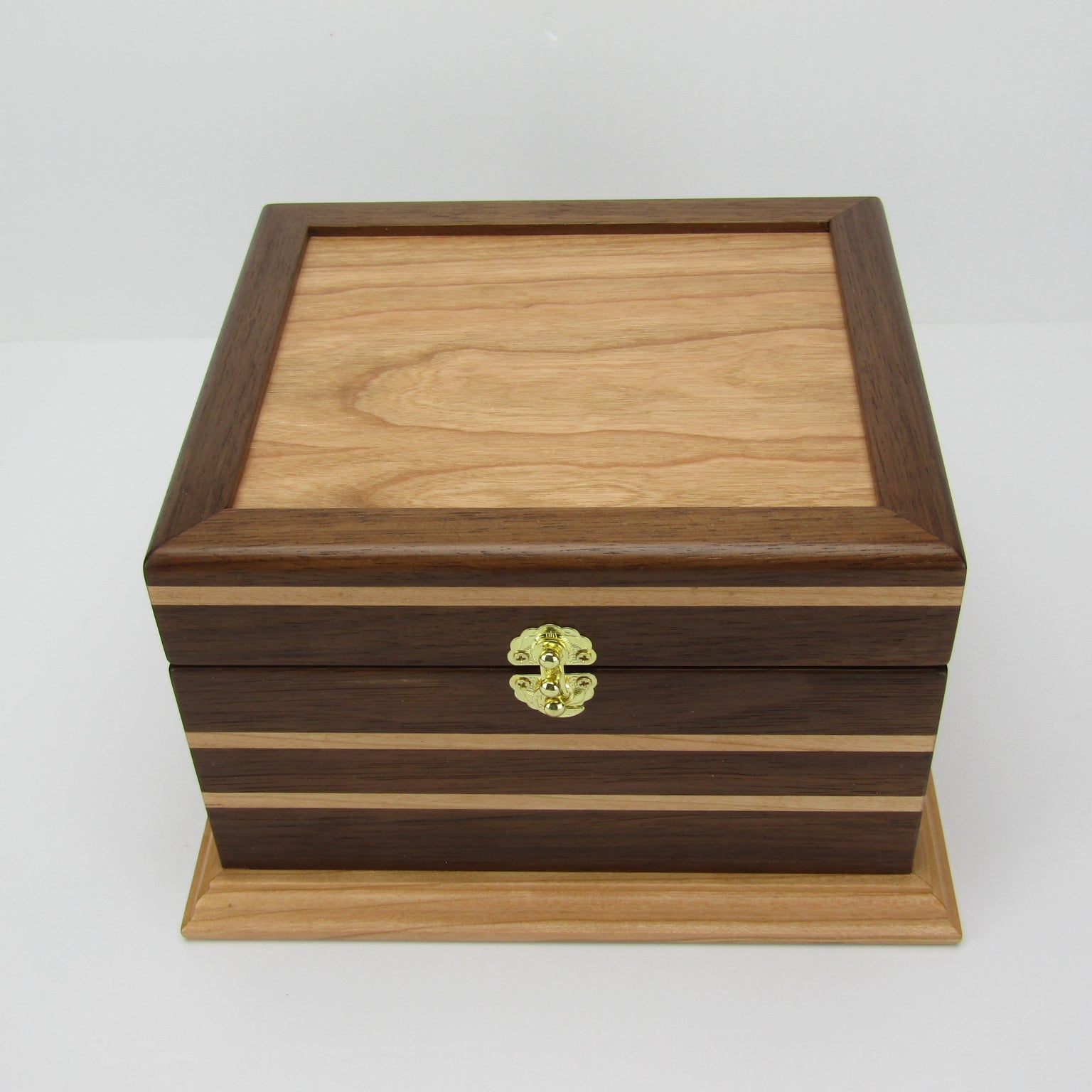 Top view of keepsake memory box handmade from Peruvian walnut and cherry by A Finer Cut Woodwork.
