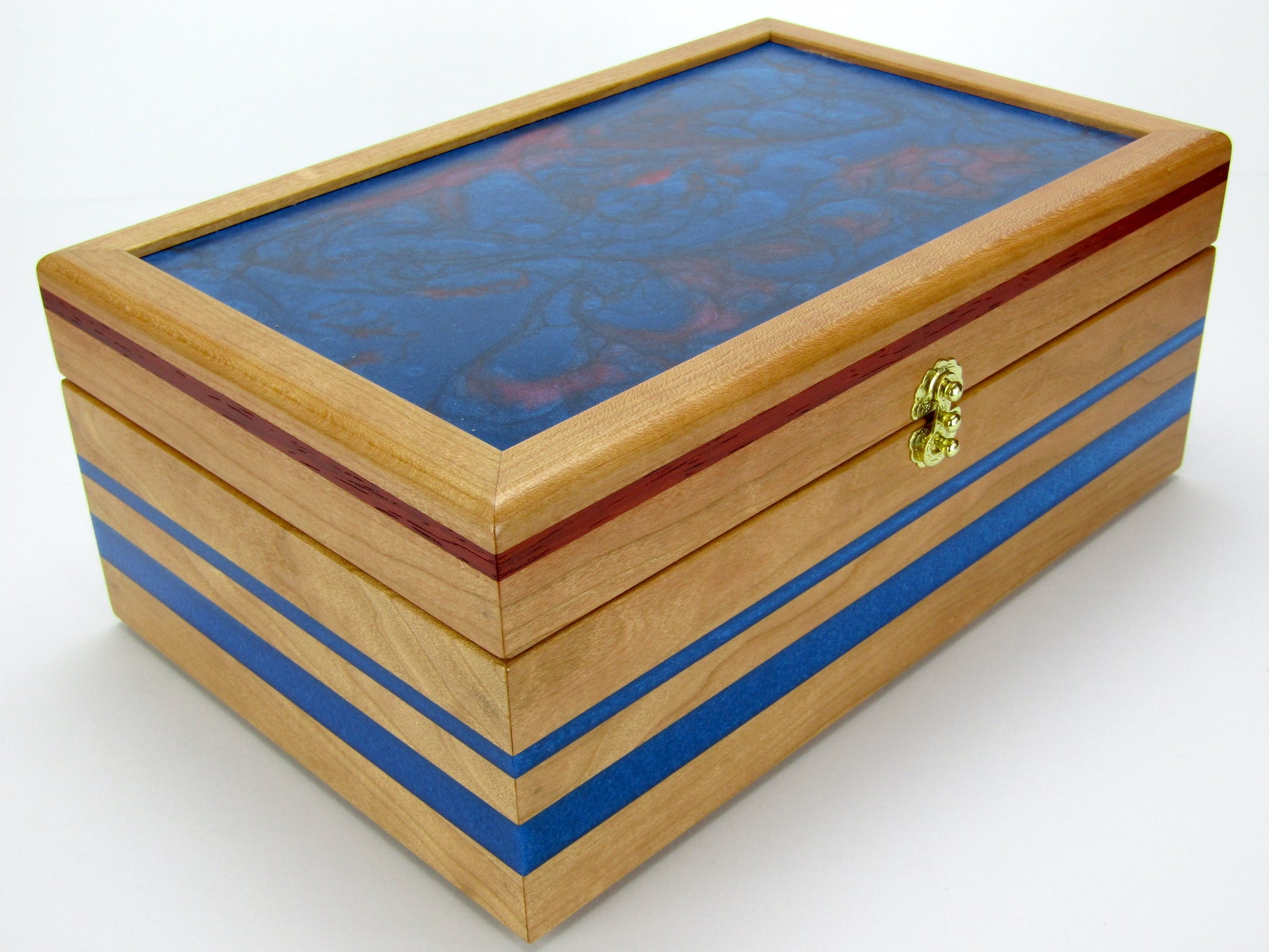 Front view of keepsake memory box handmade from cherry wood with padauk and epoxy inlays by A Finer Cut Woodwork.