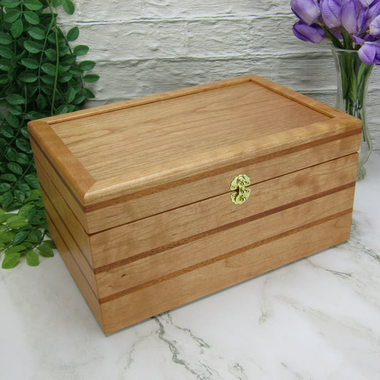 Thumbnail of large keepsake box handmade from cherry, mahogany, and cherry veneer by A Finer Cut Woodworking.
