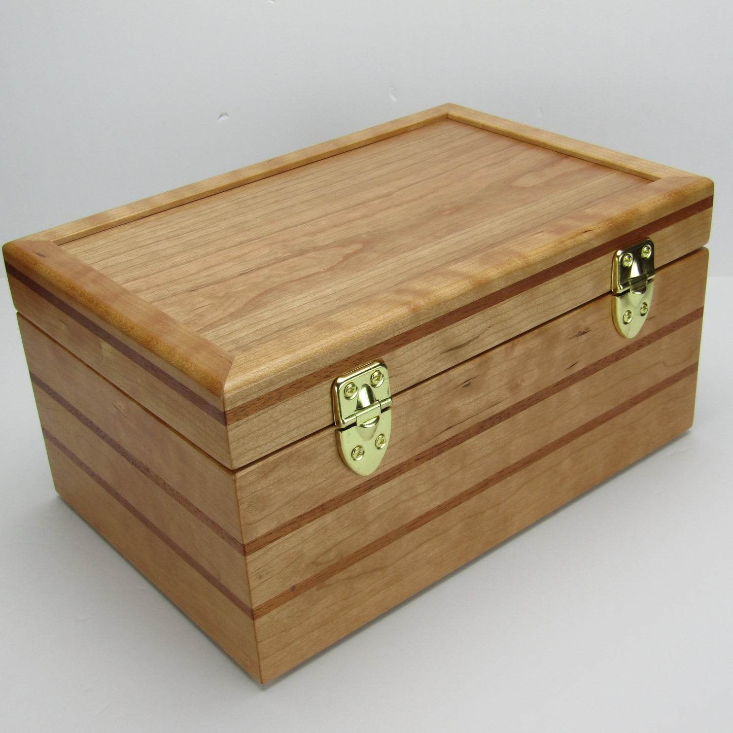 Back view of large keepsake box handmade from cherry, mahogany, and cherry veneer by A Finer Cut Woodworking.