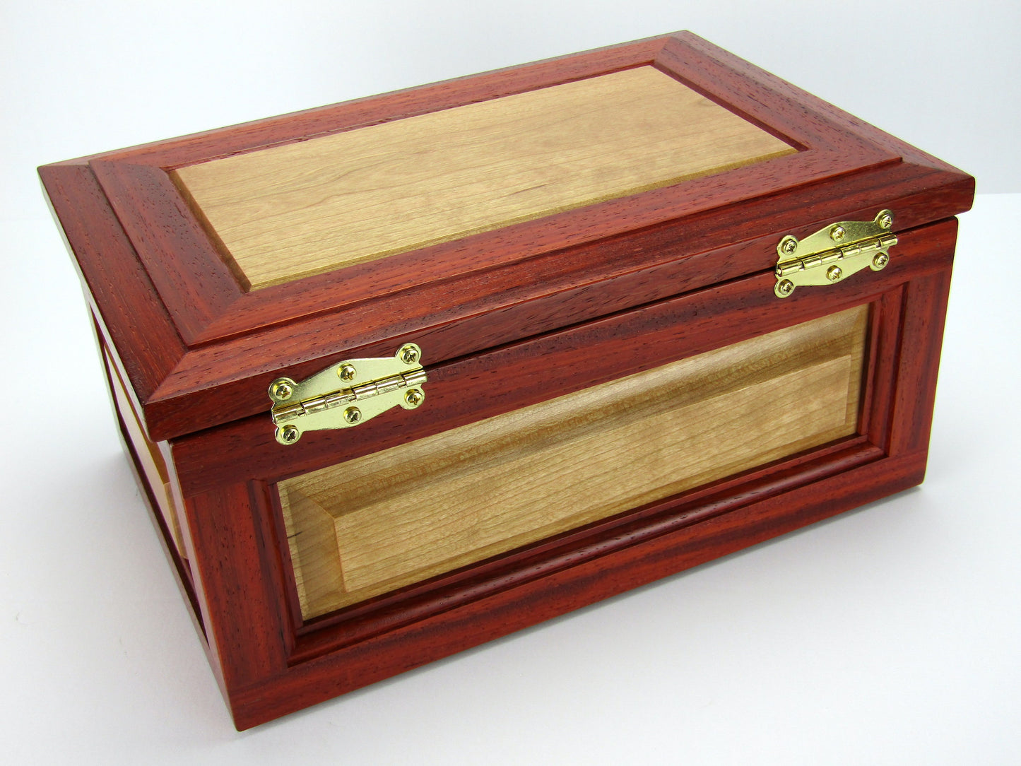 Back view of large keepsake box with raised panels handcrafted from padauk and cherry wood by A Finer Cut.