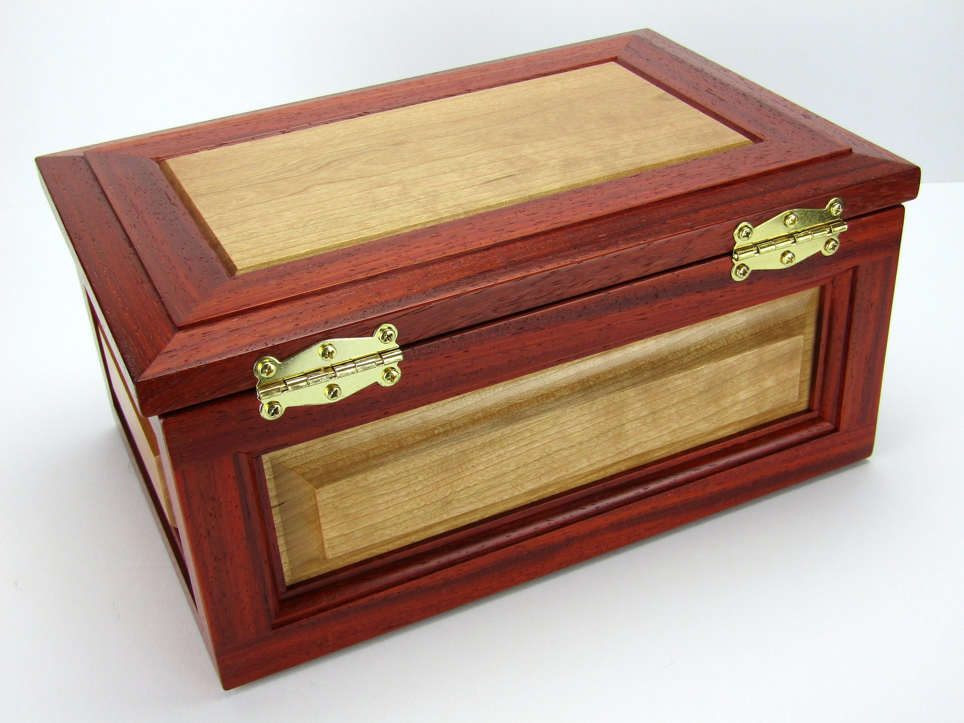 Back view of large keepsake box with raised panels handcrafted from padauk and cherry wood by A Finer Cut.