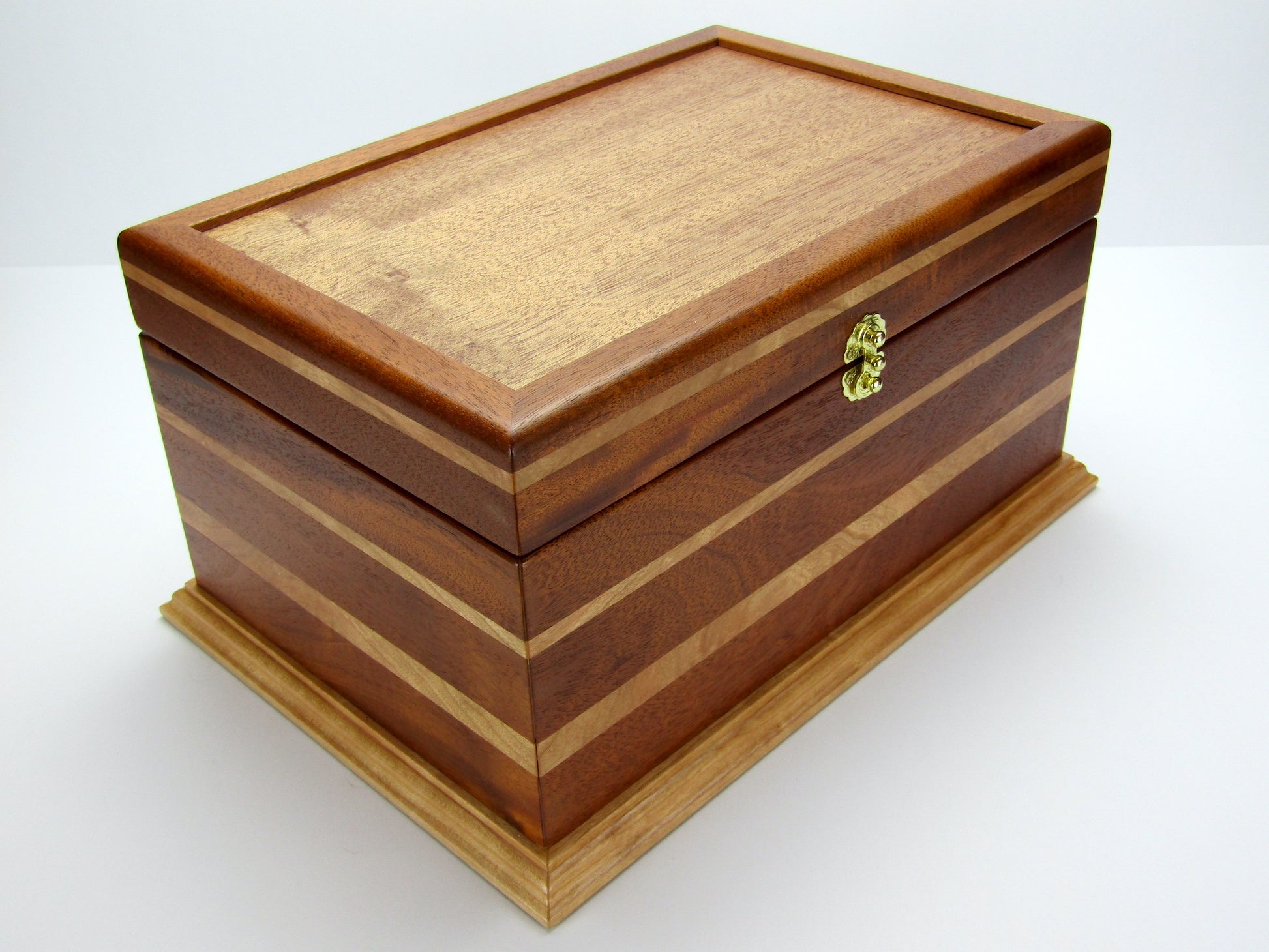 Front view of large keepsake box handmade from Honduran mahogany and cherry wood by A Finer Cut Woodworking.