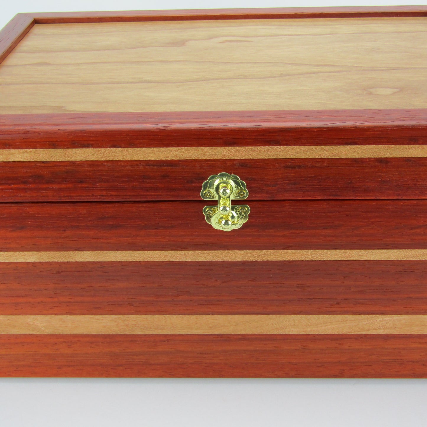 >Front view of large memory box handmade from padauk and cherry wood by A Finer Cut Woodworking.