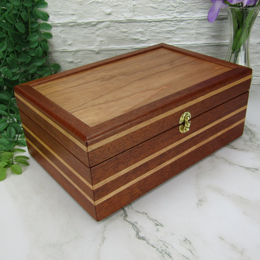 Thumbnail of unique memorial box handcrafted from Honduran mahogany and cherry by A Finer Cut Woodworking. 