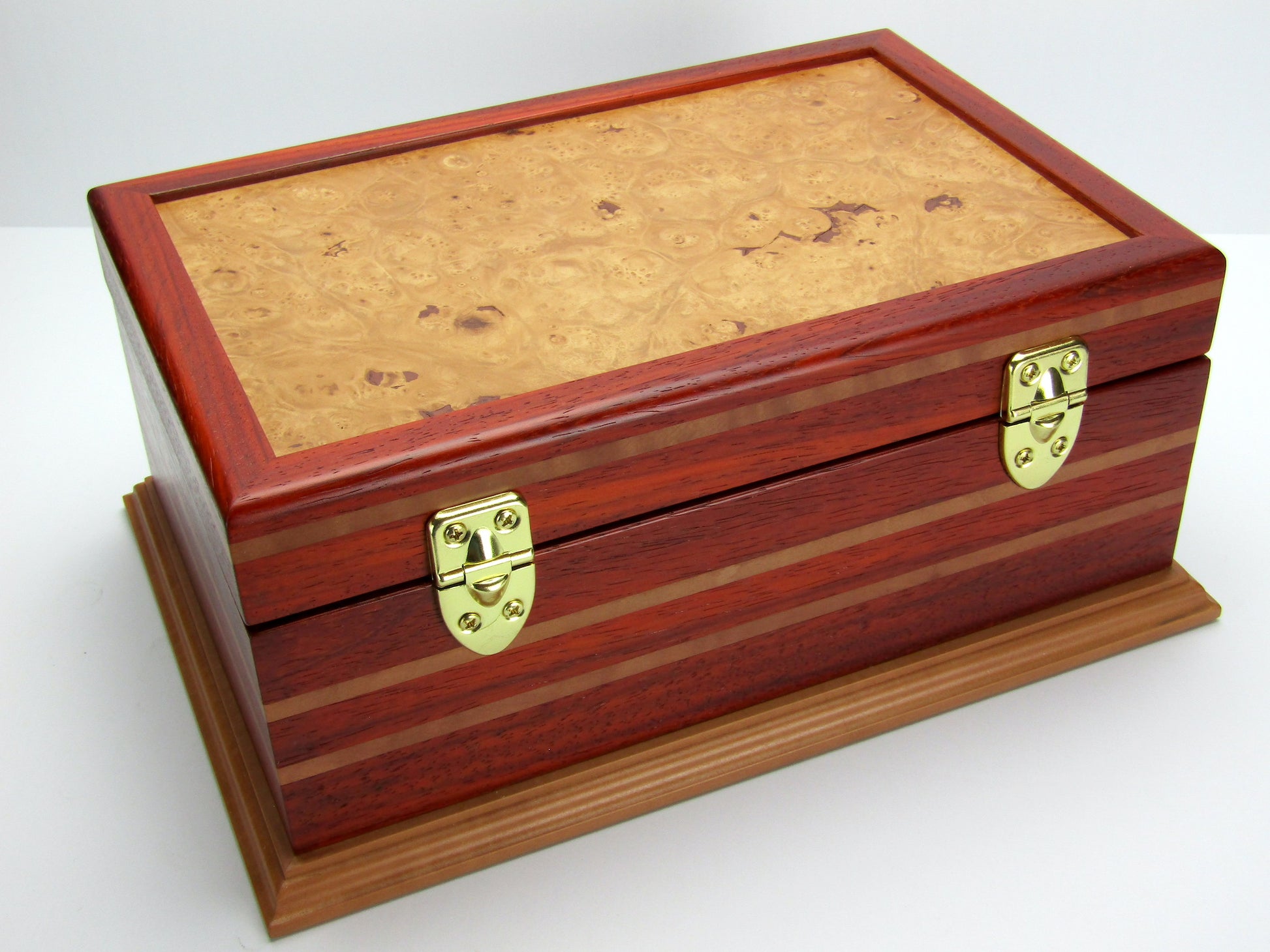 Back view of unique memorial box handcrafted from red padauk and pear wood by A Finer Cut Woodworking. 