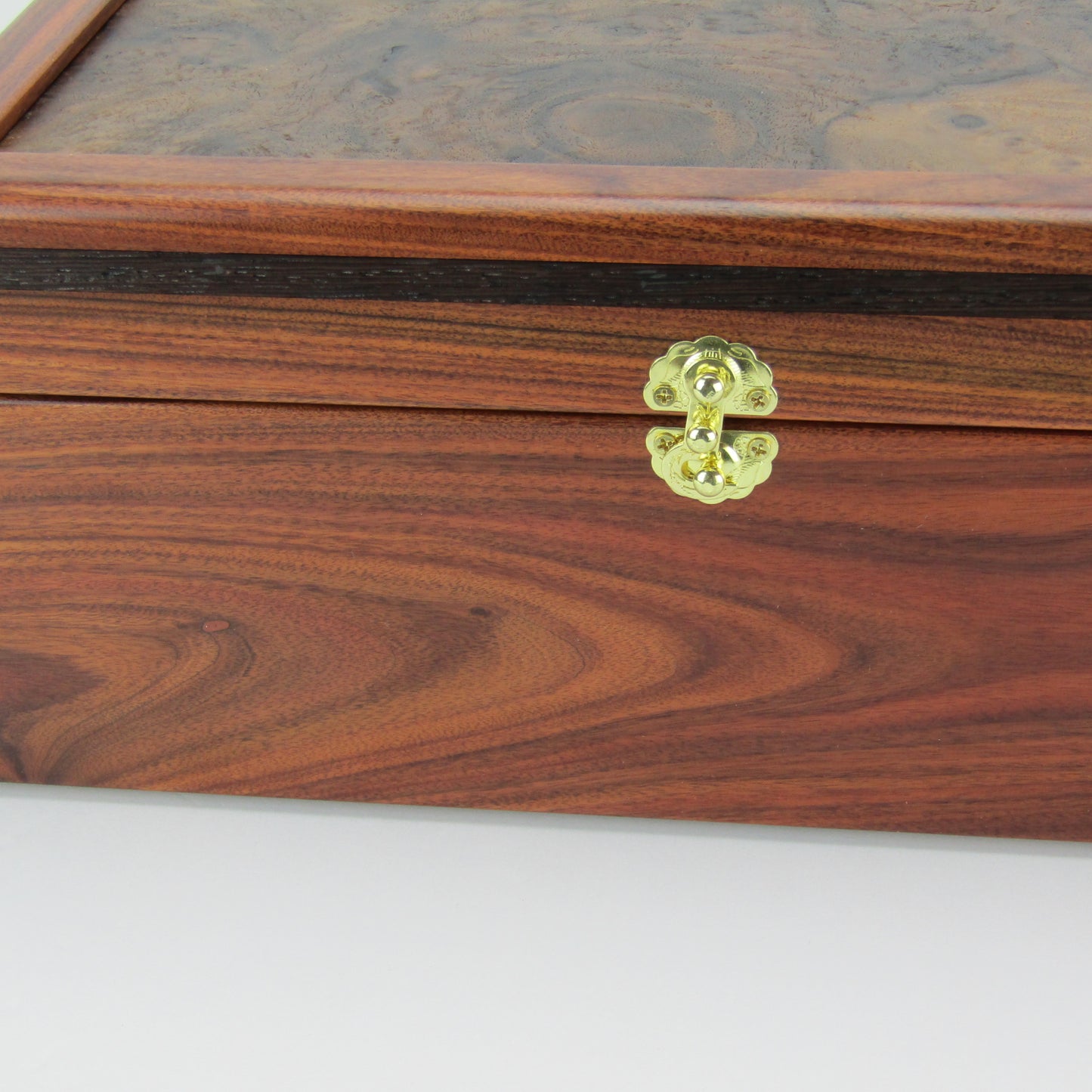 >Front view of unique memorial box handcrafted from Bolivian rosewood, wenge, and walnut burl veneer by A Finer Cut Woodworking. 