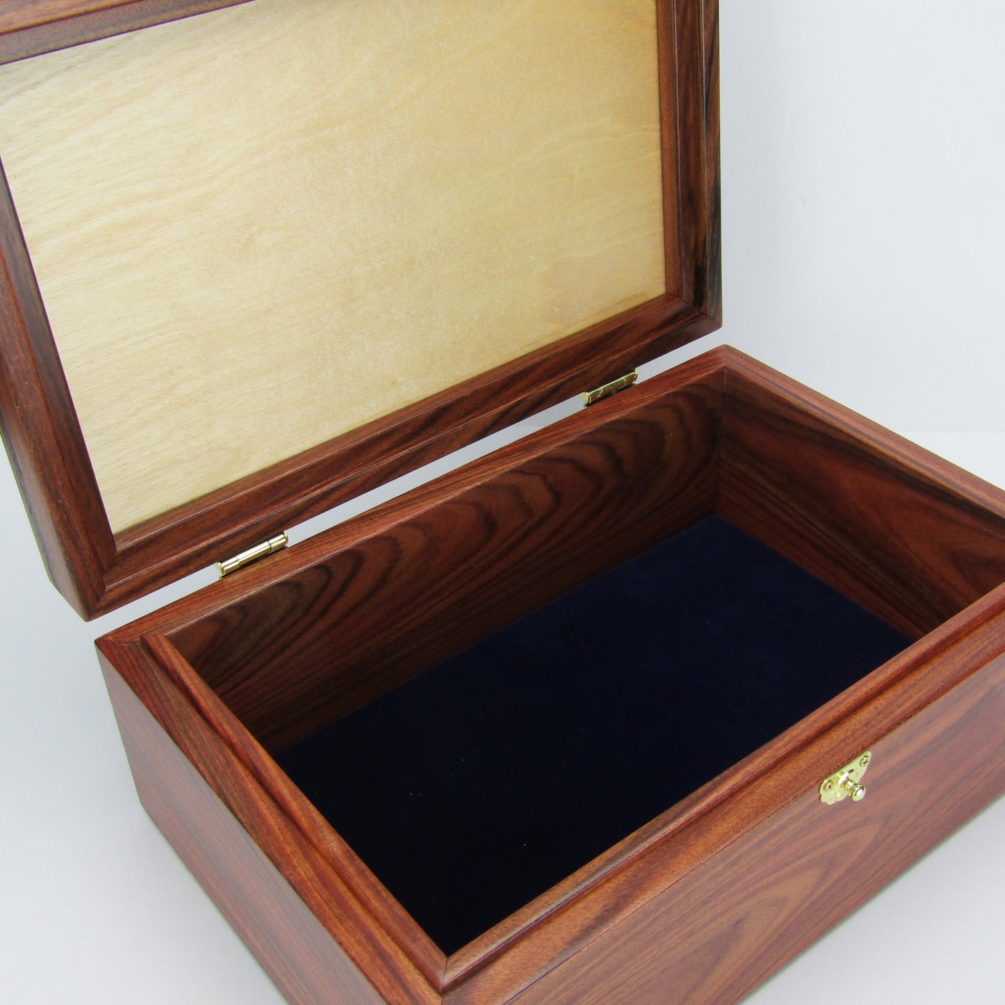 >Interior view of unique memorial box handcrafted from Bolivian rosewood, wenge, and walnut burl veneer by A Finer Cut Woodworking. 