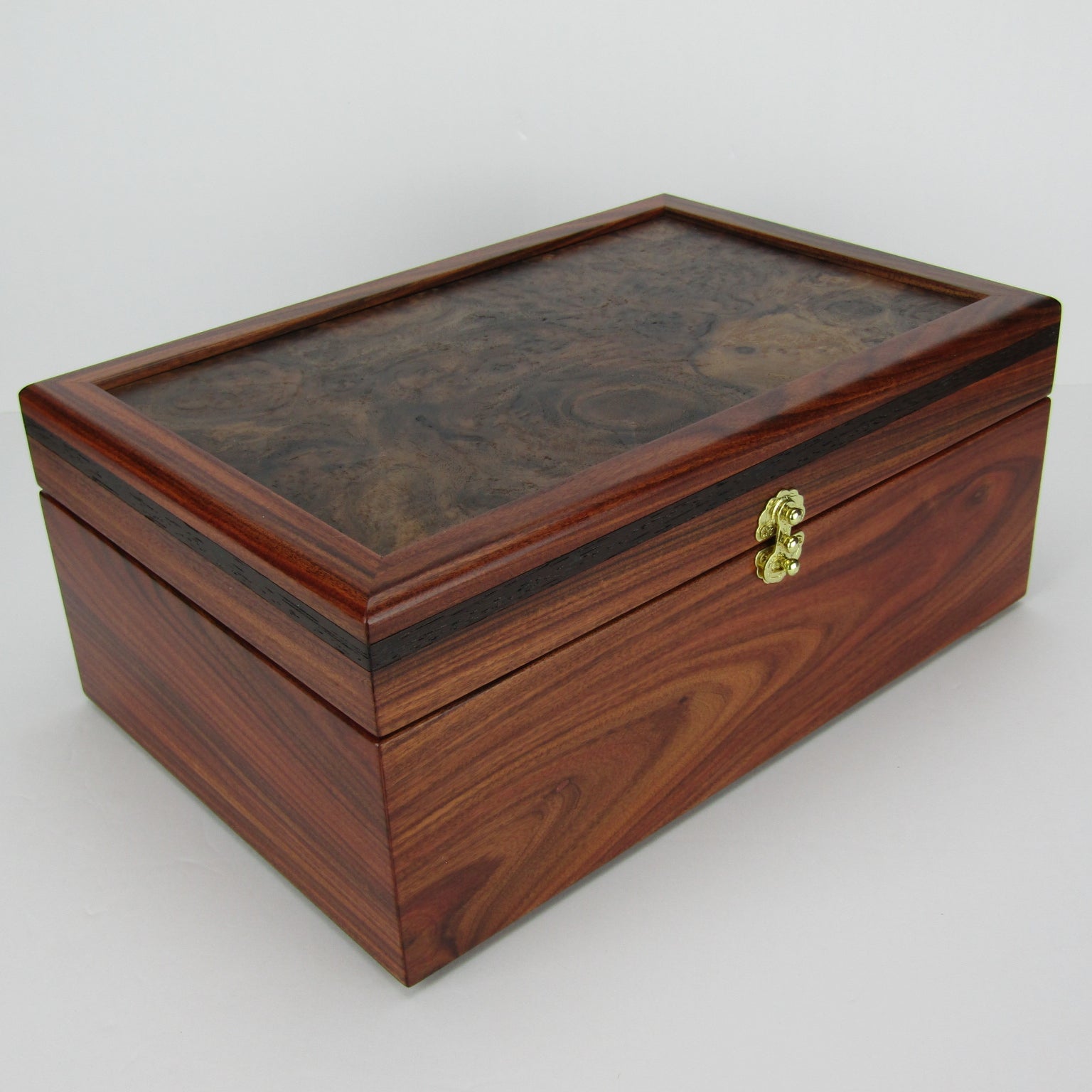 >Front corner view of unique memorial box handcrafted from Bolivian rosewood, wenge, and walnut burl veneer by A Finer Cut Woodworking. 