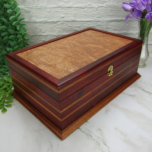 Thumbnail of unique memorial keepsake box handmade from padauk, mahogany, and maple burl veneer  by A Finer Cut Woodworking.