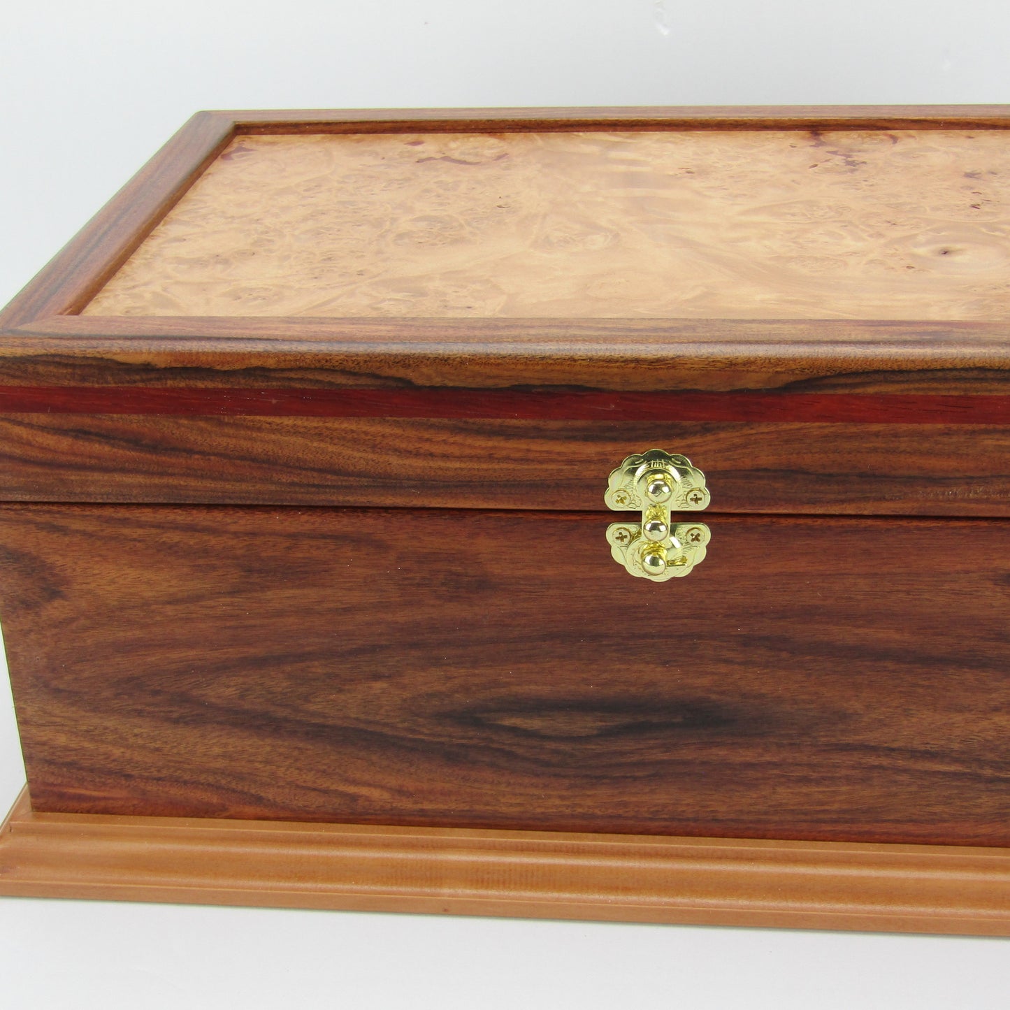 Front view of unique memorial keepsake box handmade from Bolivian rosewood and padauk by A Finer Cut Woodworking.