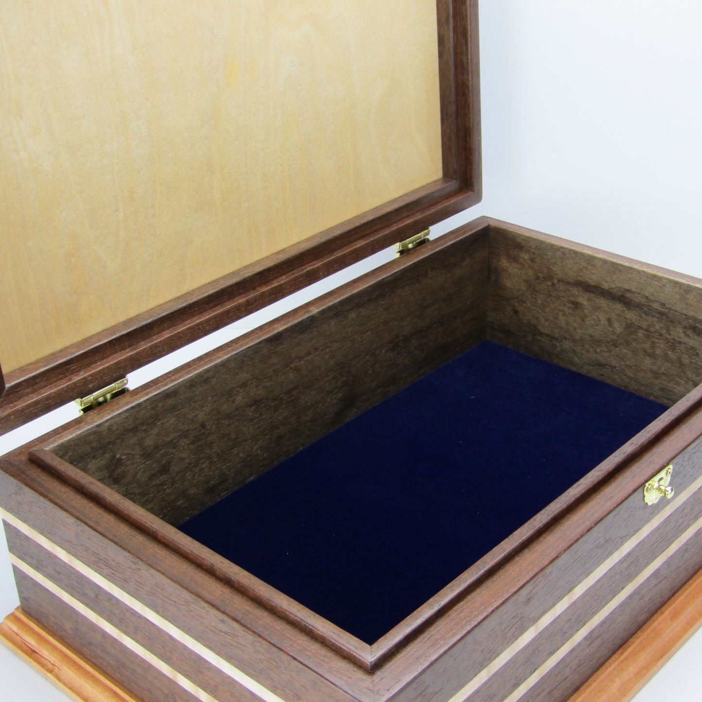 Interior view of unique memorial keepsake box handmade from Peruvian walnut, curly maple, cherry, and bird's eye maple veneer  by A Finer Cut Woodworking.