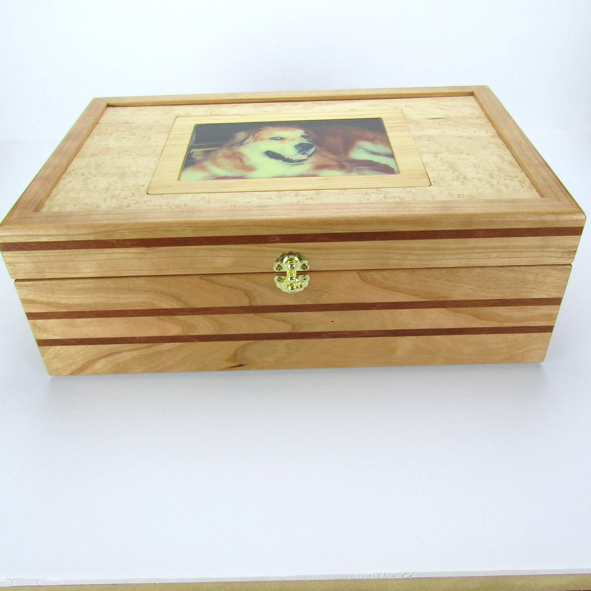 Front view of pet memorial box with photo lid handmade from cherry, mahogany, and birds eye maple veneer by A Finer Cut Woodwork.