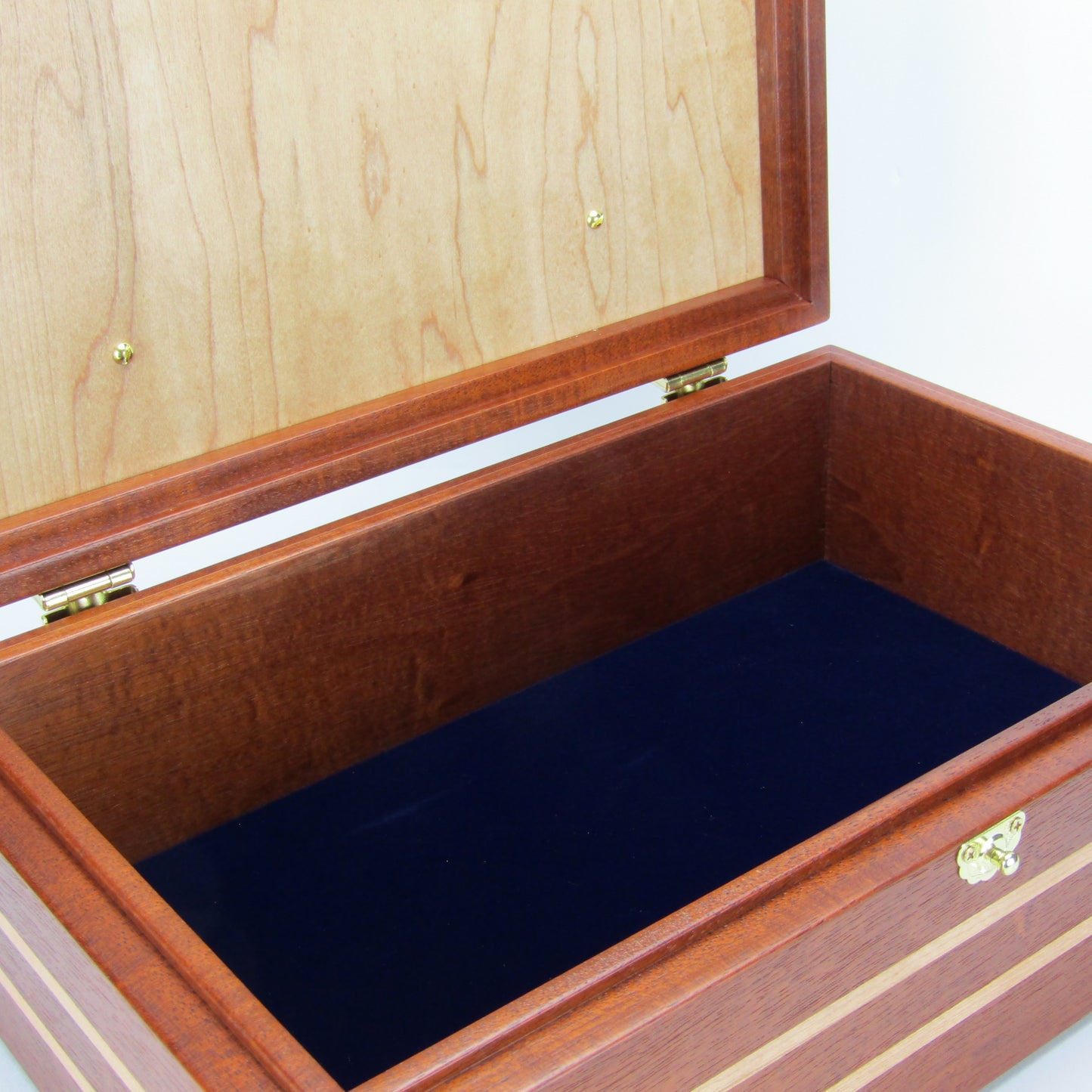 Interior view of pet memory box with photo lid handmade from Honduran mahogany and cherry by A Finer Cut Woodworking.