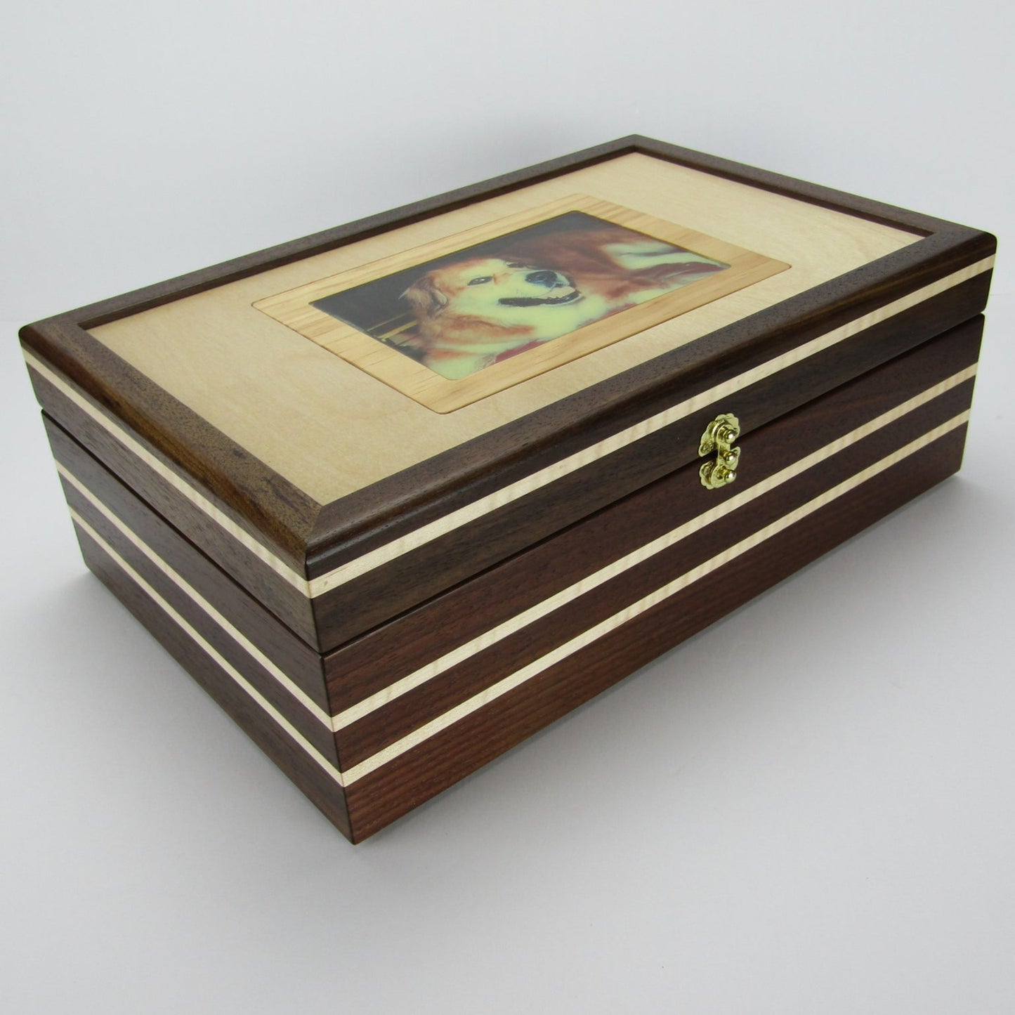 Full view corner of pet memory box with photo lid handmade from Peruvian walnut and curly maple by A Finer Cut Wood.