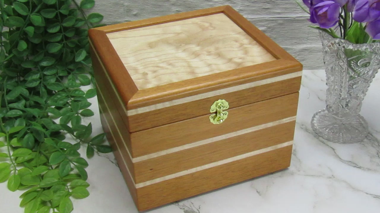 Video showing details of unique small keepsake box handmade from mahogany and maple wood by A Finer Cut Woodworking. 