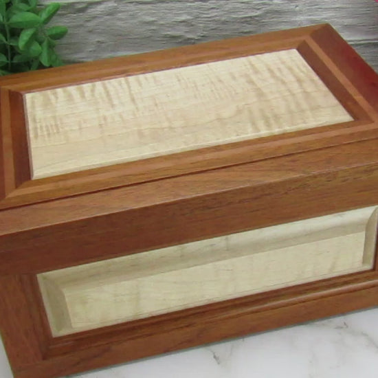 Video showing details of large keepsake box handmade from Honduran mahogany, curly maple and pear wood by A Finer Cut Wood.