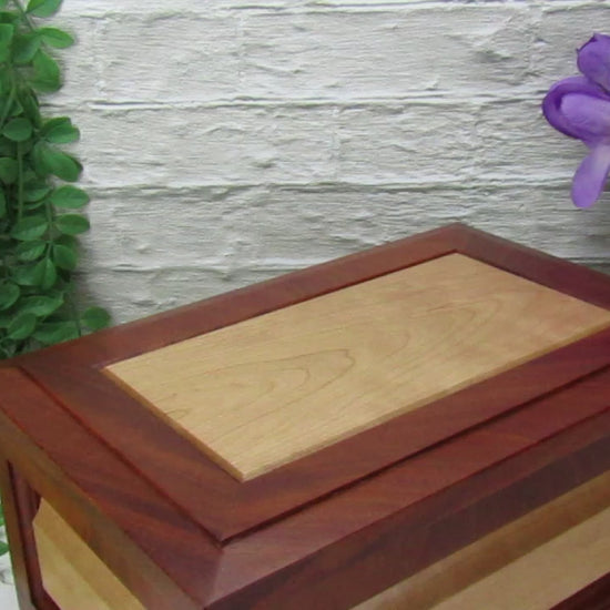 Video showing details of large keepsake box handmade from Honduran mahogany and cherry by A Finer Cut Woodworking.
