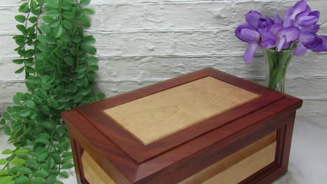 Video showing details of large keepsake box handmade from Honduran mahogany and cherry by A Finer Cut Woodworking.